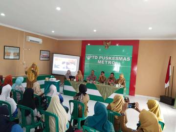 Camat Metro Pusat Membuka Kegiatan Lokakarya Mini Lintas Sektor