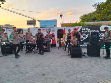 Tameng Band Polda Sumut Meriahkan CFD Kota Medan