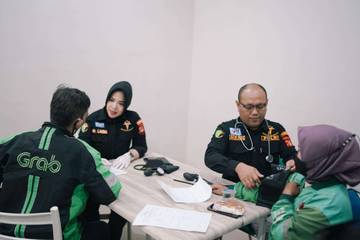 Pengobatan Gratis Ojol oleh Sie Dokkes Polrestabes Palembang 