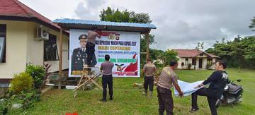 Polsek Meranti Pasang Banner Operasi Mantap Praja 2024