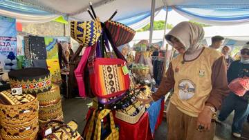 Wako dan Istri di Pembukaan Begawi Jejama Apeksi