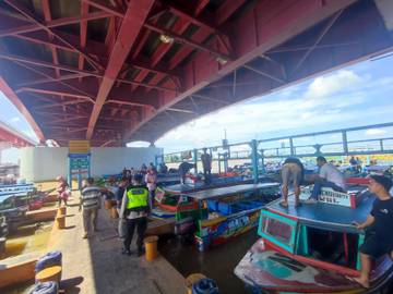 Potret Suasana Mudik di Dermaga Jembatan Ampera Palembang