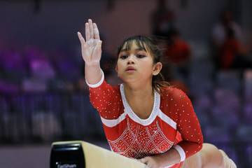 Aksi Alarice di Balance Beam dalam Kejuaraan Gimnastik