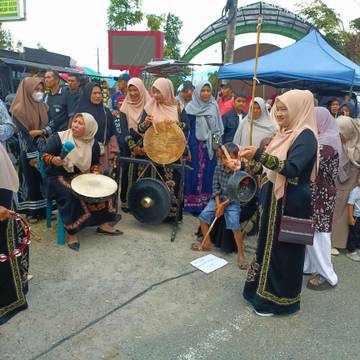 PKK Tiga Kampung Menyambut Kirab Obor PON XXI