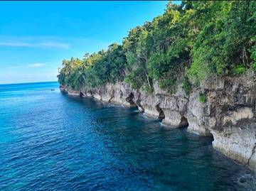 Pantai Lubang Lima: Hidden Paradise yang Kembali Jadi Spot Foto Favorit