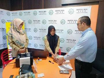 PT BPR Syariah Mustaqim Aceh Bayar Zakat Karyawan 