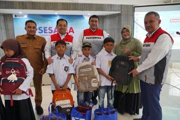 Seribu Seragam Sekolah untuk Korban Bencana Aceh 