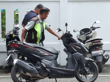 Profesi Parkir Menopang Ekomomi Keluarga