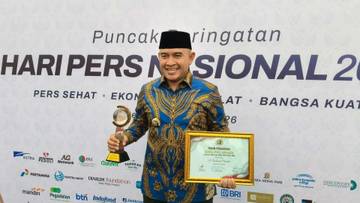 Bupati Tanah Laut Terima SIWO Award HPN 2026