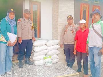 Bhabinkamtibmas Kawal Penyaluran Benih Jagung Hibrida Buton
