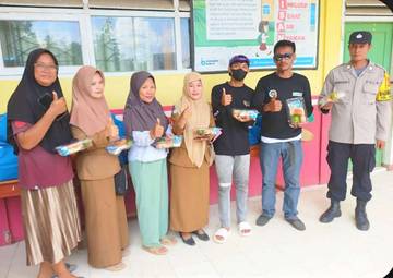 Bhabinkamtibmas Kawal Program Makan Bergizi Gratis di Batauga