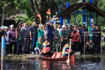 Lomba Pacu Sampan, Kemah Budaya Telaga Air Merah 
