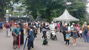 Libur Lebaran Pengunjung Kebun Raya Bogor Ramai