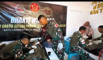 Satgas Yonif 403/WP Gelar Khitan Masal Gratis