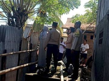 Polsek Alok Tinjau Dampak Hujan Lebat