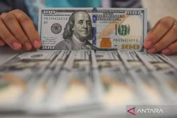 Rupiah Gains on BI Rate Hold and Global Relief