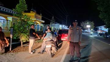 Polsek Paguyaman Amankan Pelaksanaan Sholat Tarawih di Masjid An-Nur