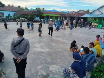 Kapolsek Paguyaman Hadiri Kegiatan Semarak Ketupat 
