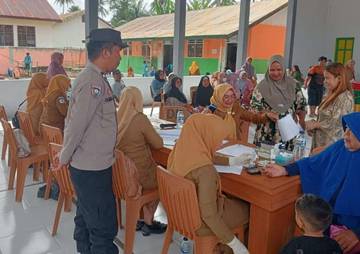 Bhabinkamtibmas Polsek Mootilango Pantau Kegiatan Integrasi Layanan Primer