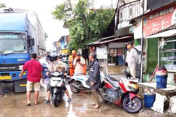 Genangan Air Surut, Mobilitas Warga  Kembali Normal