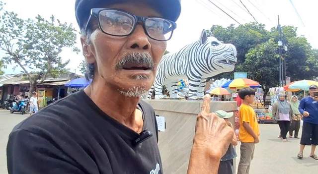 ​Menyusuri Mitos dan Pesona Patung Macan Putih Kediri