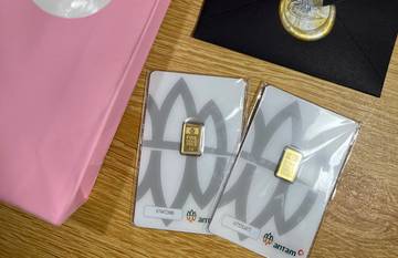 ‎Harga Emas Antam Menguat Rp13.000 per Gram