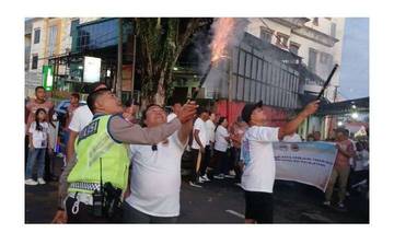 Polsek Malalayang  Amankan Kegiatan Jalan Sehat Jemaat Lahai Roi