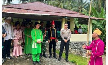 Polsek Wori Kawal Kemeriahan Pesta Adat Tulude 