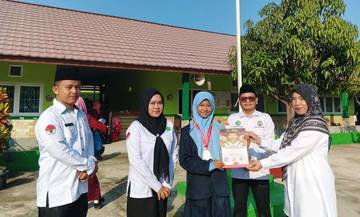 Siswi MTsN 1 Palembang Raih Emas Kejuaraan Taekwondo