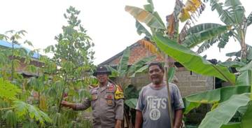 Bhabinkamtibmas Ajak Warga Sungairebo Tanam Pangan