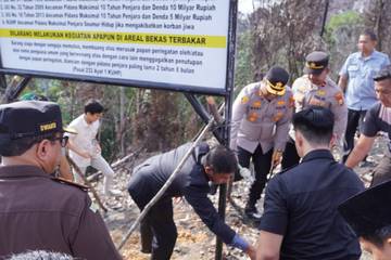Polres Kampar Pasang 32 Papan Larangan Karhutla