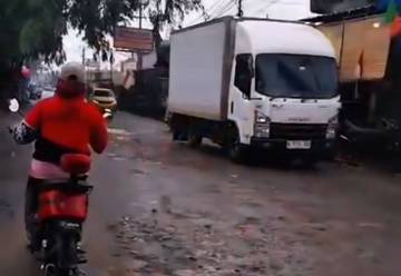 Ratusan Titik Jalan Tangerang Rusak Akibat Banjir