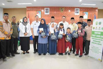 Pemko Sibolga-BAZNAS Salurkan Bantuan Paket Sekolah dan Ibadah 