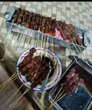 Tradisi Bakar Sate Meriahkan Usai Idul Adha 1446  