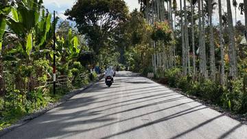Bupati Kerinci Tinjau Pengaspalan Jalan Talang Kemulun