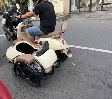 Keseruan Sepeda Listrik dengan Boncengan Samping