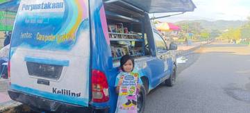 Ain Tekuni Membaca Manfaatkan Perpustakaan Keliling